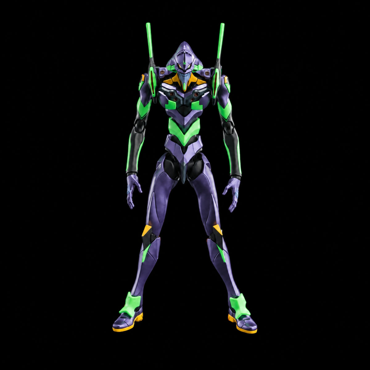 Figura Evangelion UNIT-01 de Blokees, vista frontal de cuerpo completo en morado, verde y amarillo sobre fondo negro.