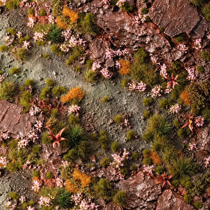 Flores rosas Pink Orchid de Gamer’s Grass en un diorama con rocas rojizas y vegetación verde y anaranjada.