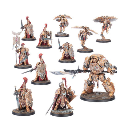 Conjunto de miniaturas Combat Patrol Adeptus Custodes de Warhammer 40.000, con armaduras doradas, penachos rojos y peanas grises.